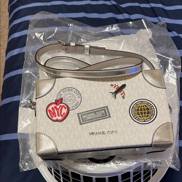 Michael Kors Handbags - Michael Kors White and Silver Crossbody Bag with Patches